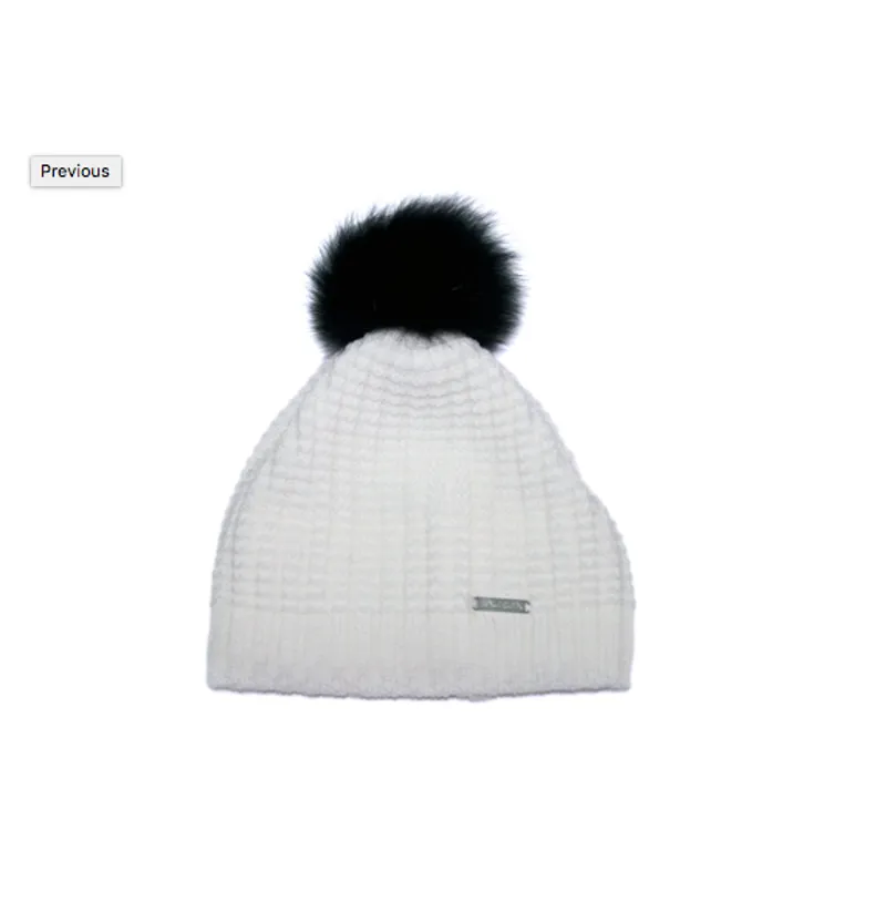 black hat with white pom pom